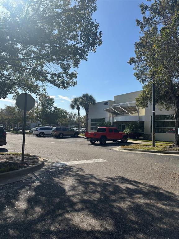 8810 Commodity Circle, Unit 1 Orlando, FL 32819 - Photo 33 of 33 a car parked on the side of the road