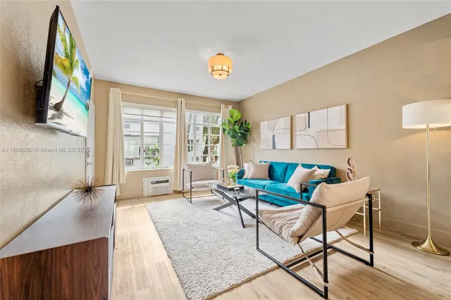 a living room with furniture and a window
