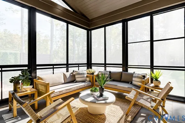 an aerial view of a house with a garden