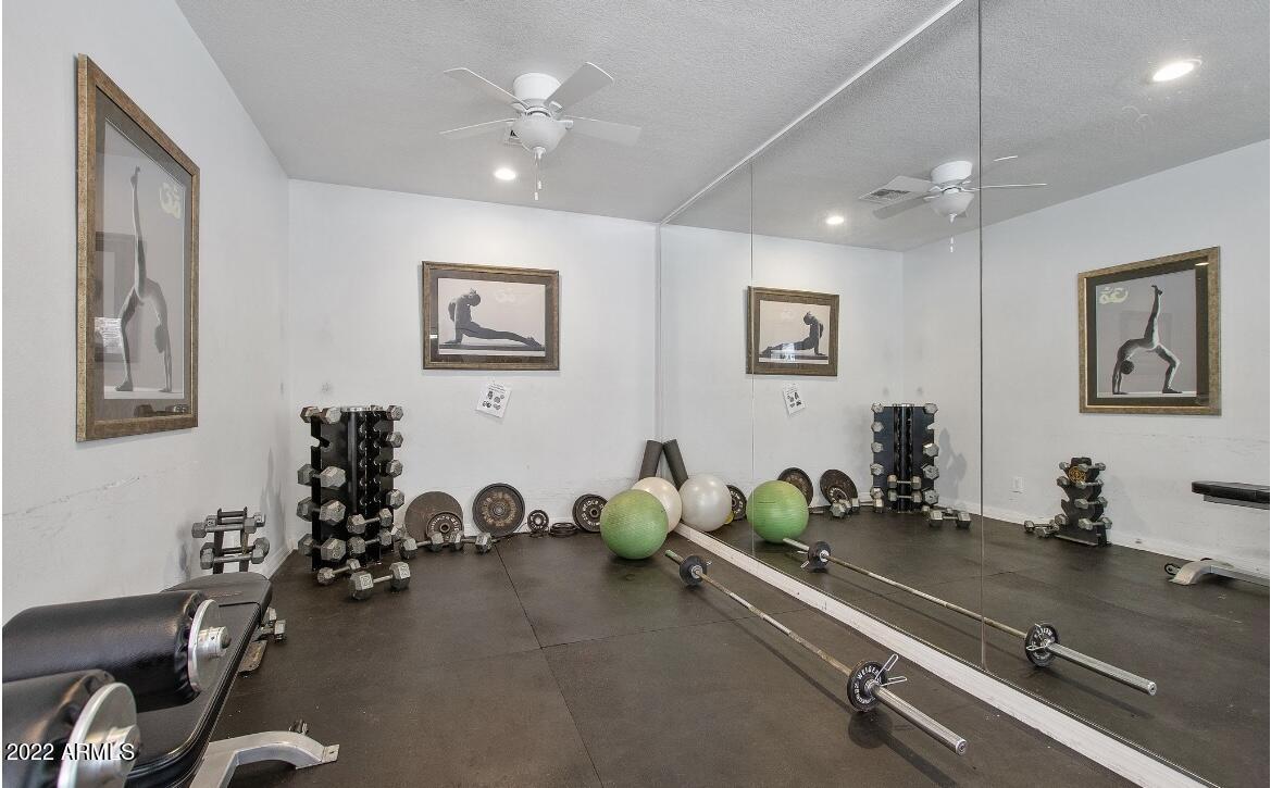 2025 East Campbell Avenue, Unit 363 Phoenix, AZ 85016 - Photo 15 of 18 a room with gym equipment