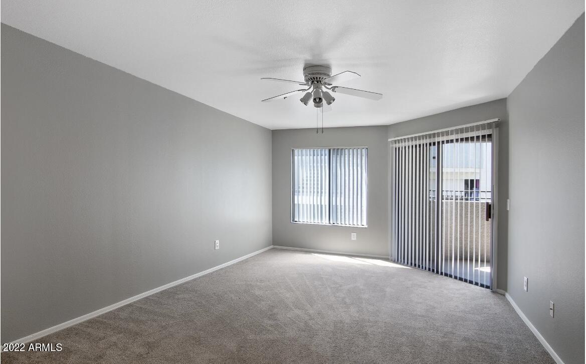 2025 East Campbell Avenue, Unit 363 Phoenix, AZ 85016 - Photo 6 of 18 a view of an empty room with a window