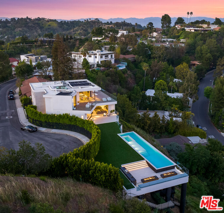 9674 Highridge Drive Beverly Hills, CA 90210 - Photo 29 of 29 an aerial view of a house with a garden and lake view