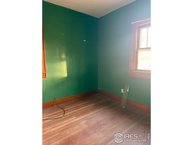 a view of a room that has a window