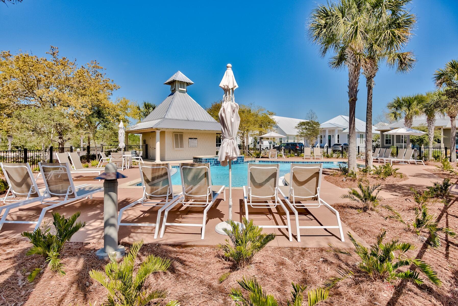 Lot 26 Cypress Ridge Santa Rosa Beach, FL 32459 - Photo 4 of 58 *Phase 2 pool with chairs and umbrella