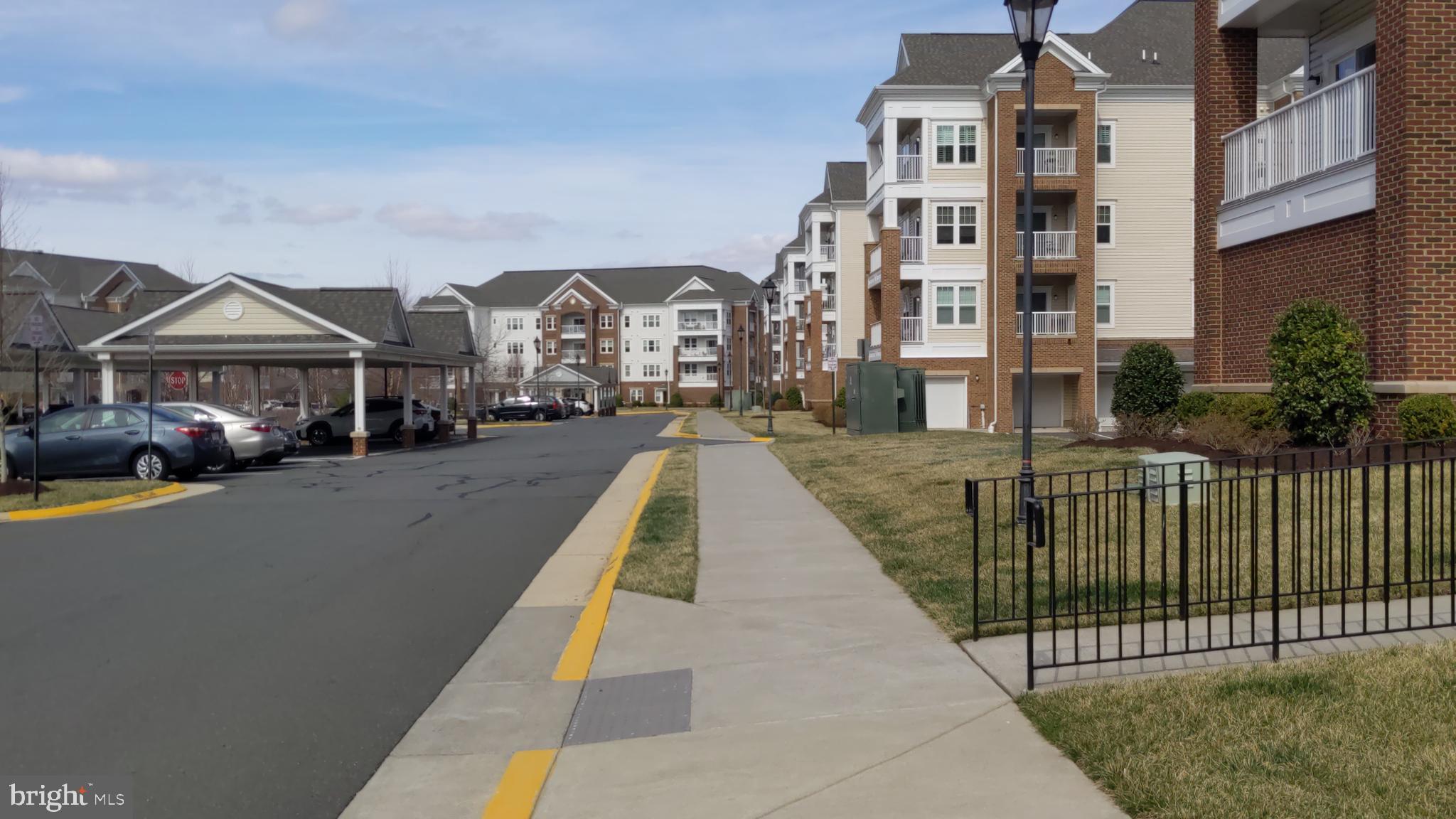 20620 Hope Spring Terrace, Unit 403 Ashburn, VA 20147 - Photo 2 of 43 Wide streets w/extra parking