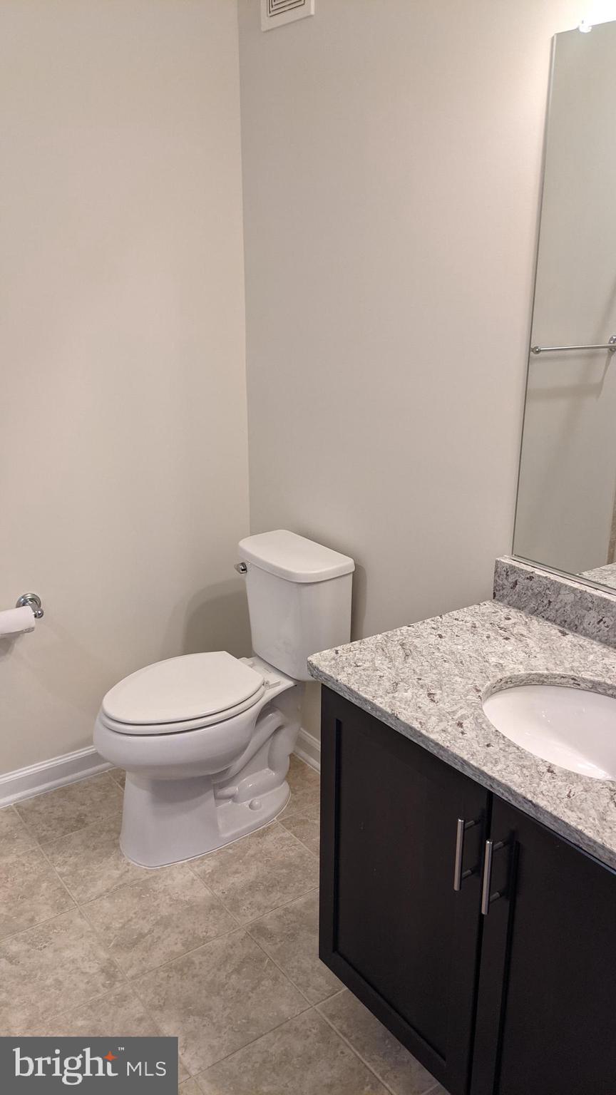 20620 Hope Spring Terrace, Unit 403 Ashburn, VA 20147 - Photo 29 of 43 1st full bathroom