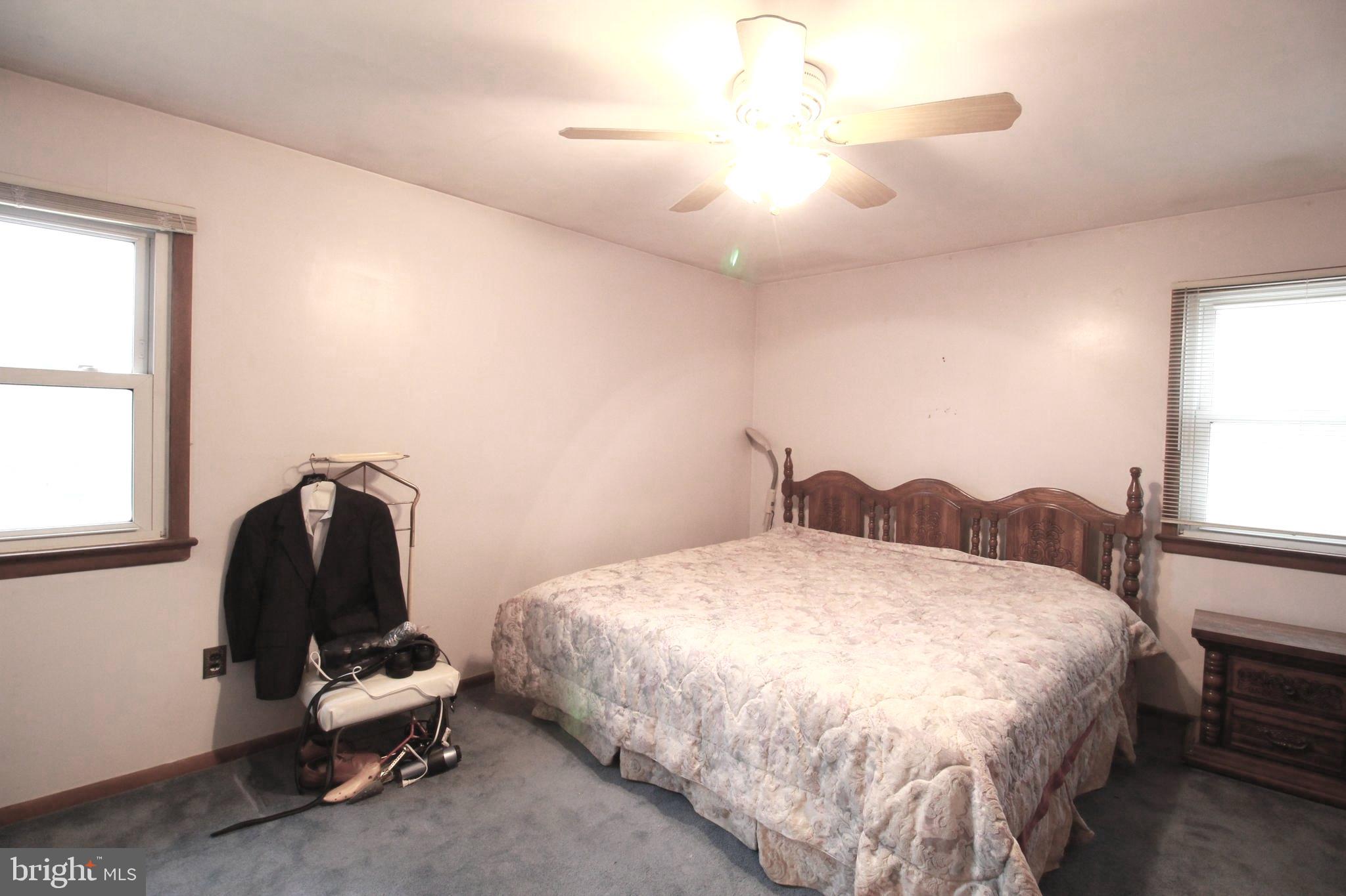 34 Applegate Road Jobstown, NJ 08041 - Photo 11 of 29 a bedroom with a bed and a window