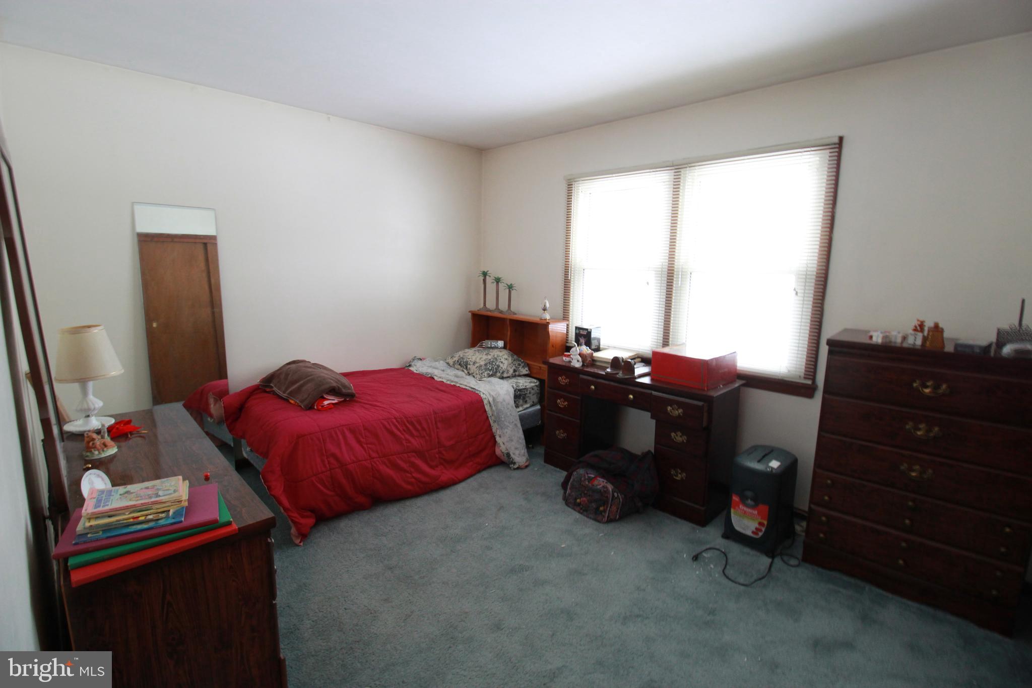 34 Applegate Road Jobstown, NJ 08041 - Photo 13 of 29 a bedroom with a bed and a window