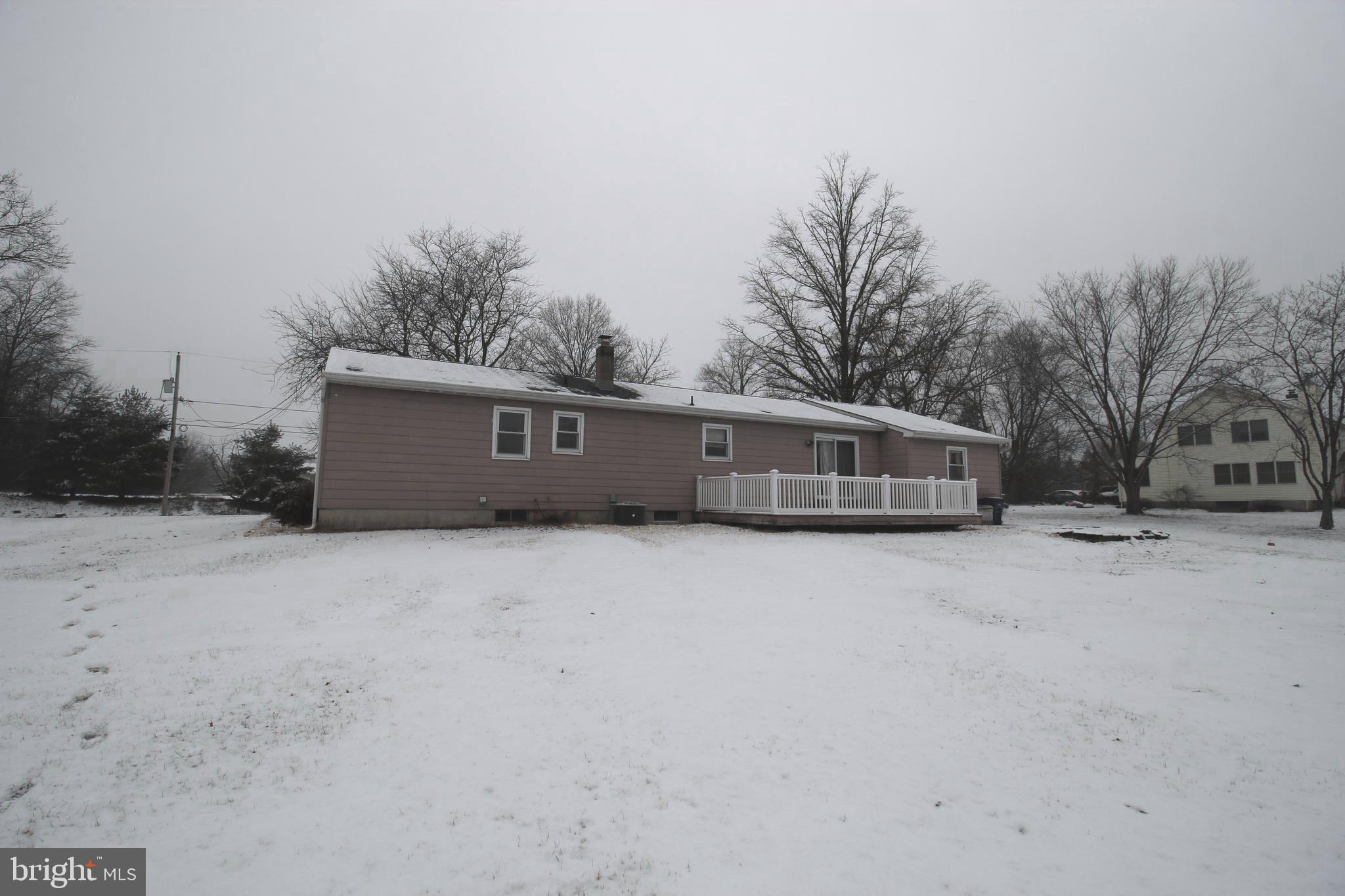 34 Applegate Road Jobstown, NJ 08041 - Photo 25 of 29 a house with trees in front of it