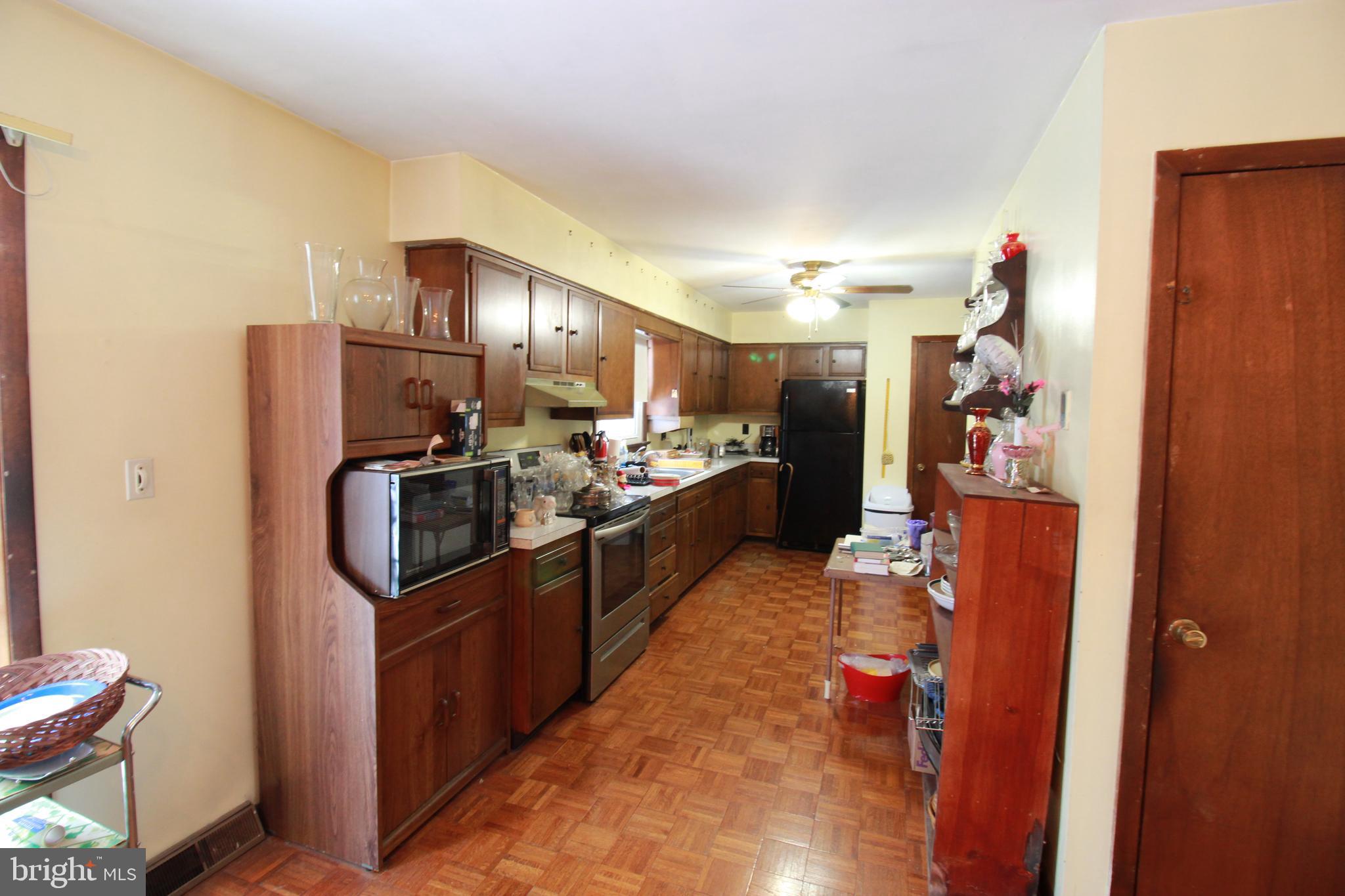 34 Applegate Road Jobstown, NJ 08041 - Photo 8 of 29 a kitchen with stainless steel appliances kitchen island granite countertop a refrigerator and a stove