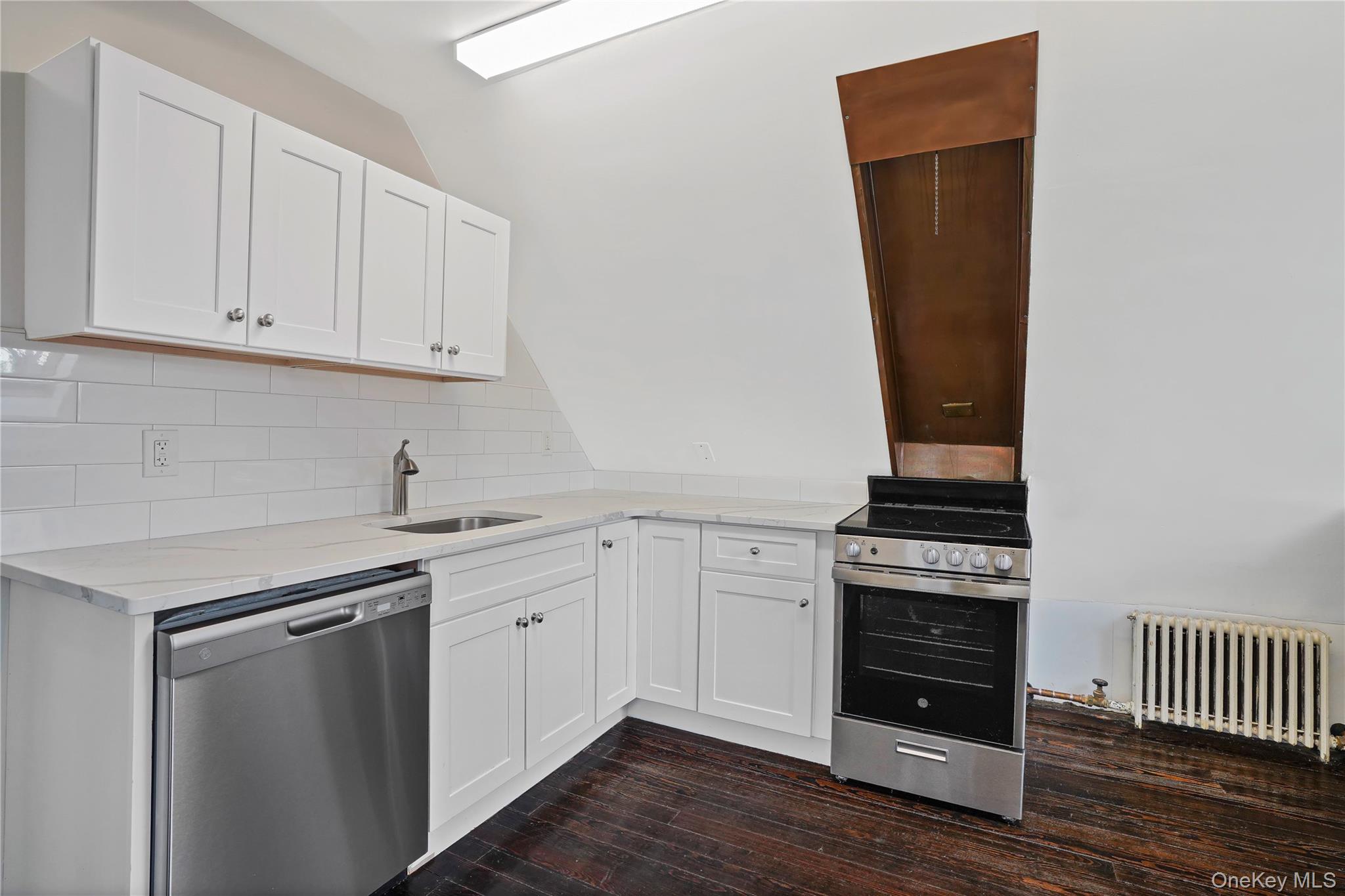9 Ridgeview Avenue White Plains, NY 10606 - Photo 16 of 20 a kitchen with stainless steel appliances granite countertop a stove and a refrigerator
