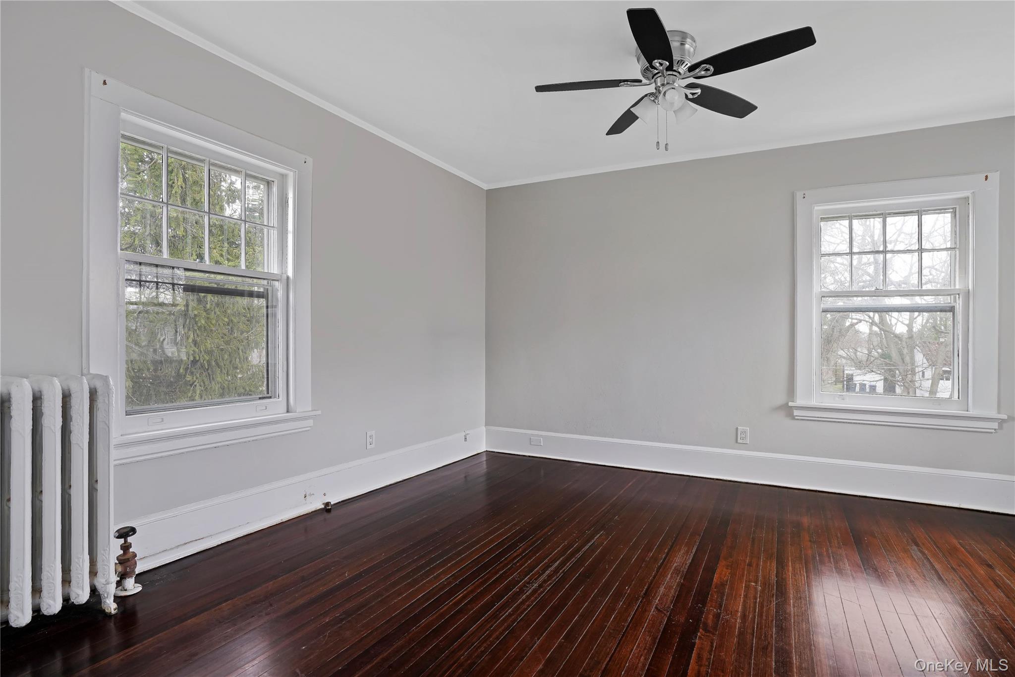 9 Ridgeview Avenue White Plains, NY 10606 - Photo 4 of 20 a view of an empty room with wooden floor and a window