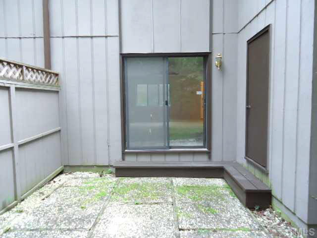 3060 Colony Road, Unit C Durham, NC 27705 - Photo 14 of 15 a view of a small space with wooden floor and a window