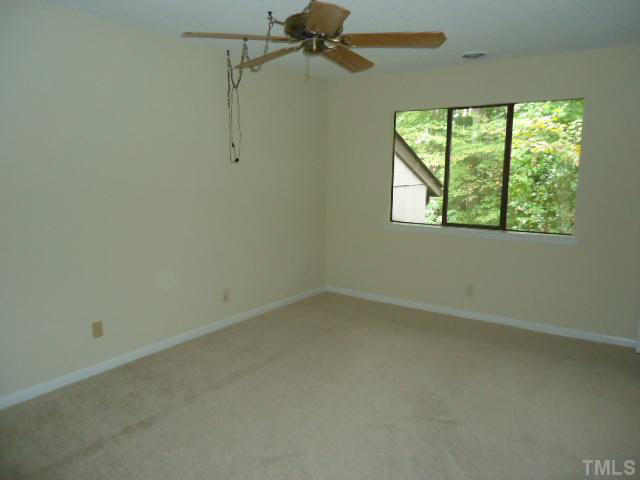 3060 Colony Road, Unit C Durham, NC 27705 - Photo 8 of 15 an empty room with a window