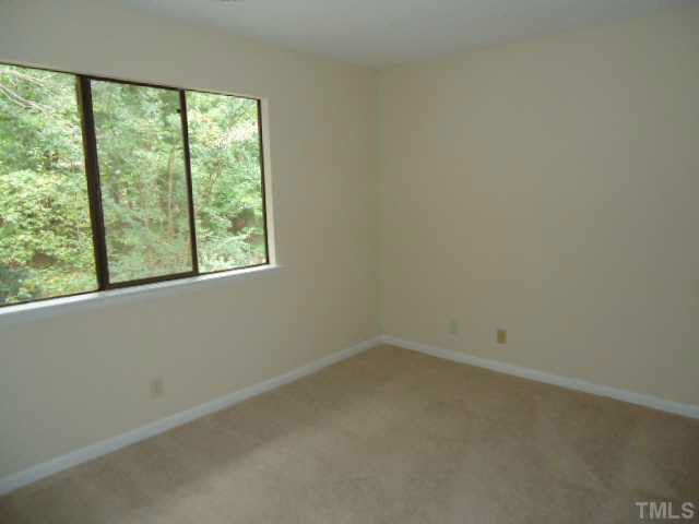 3060 Colony Road, Unit C Durham, NC 27705 - Photo 10 of 15 an empty room with a window