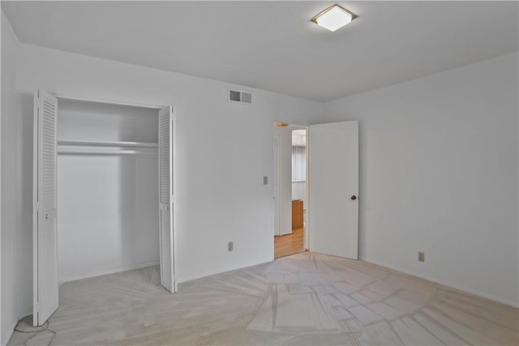 20 26th Street Northwest, Unit B1 Atlanta, GA 30309 - Photo 15 of 21 a view of an empty room