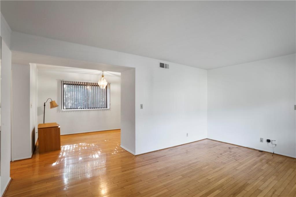 20 26th Street Northwest, Unit B1 Atlanta, GA 30309 - Photo 18 of 21 a view of empty room with wooden floor