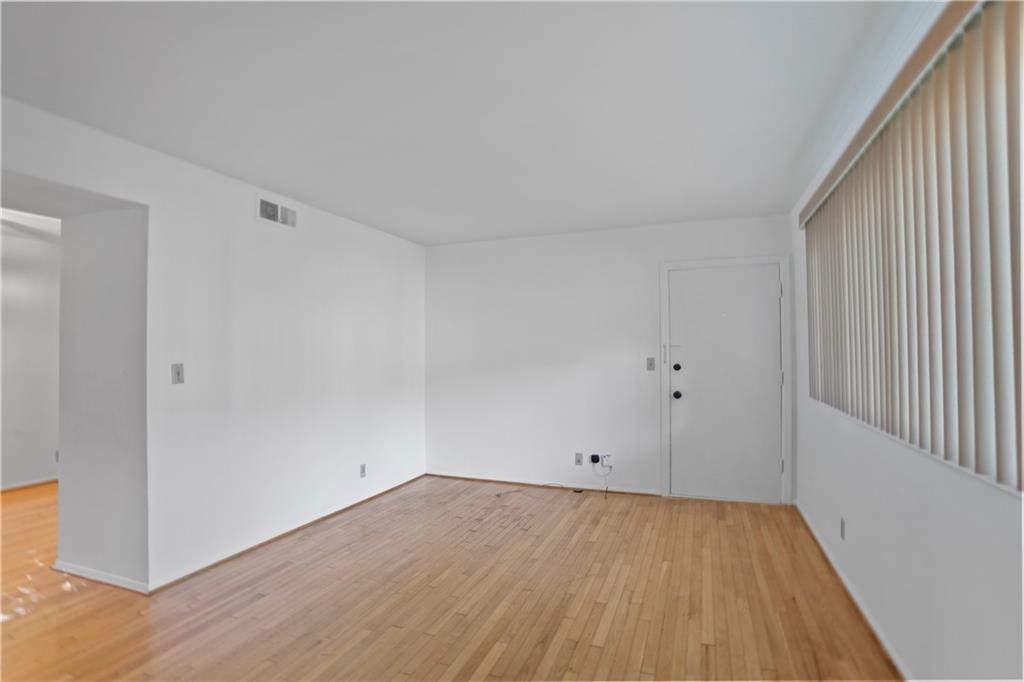 20 26th Street Northwest, Unit B1 Atlanta, GA 30309 - Photo 19 of 21 a view of a room with wooden floor
