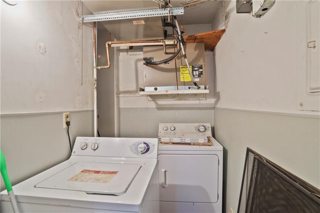 20 26th Street Northwest, Unit B1 Atlanta, GA 30309 - Photo 20 of 21 a utility room with dryer and washer