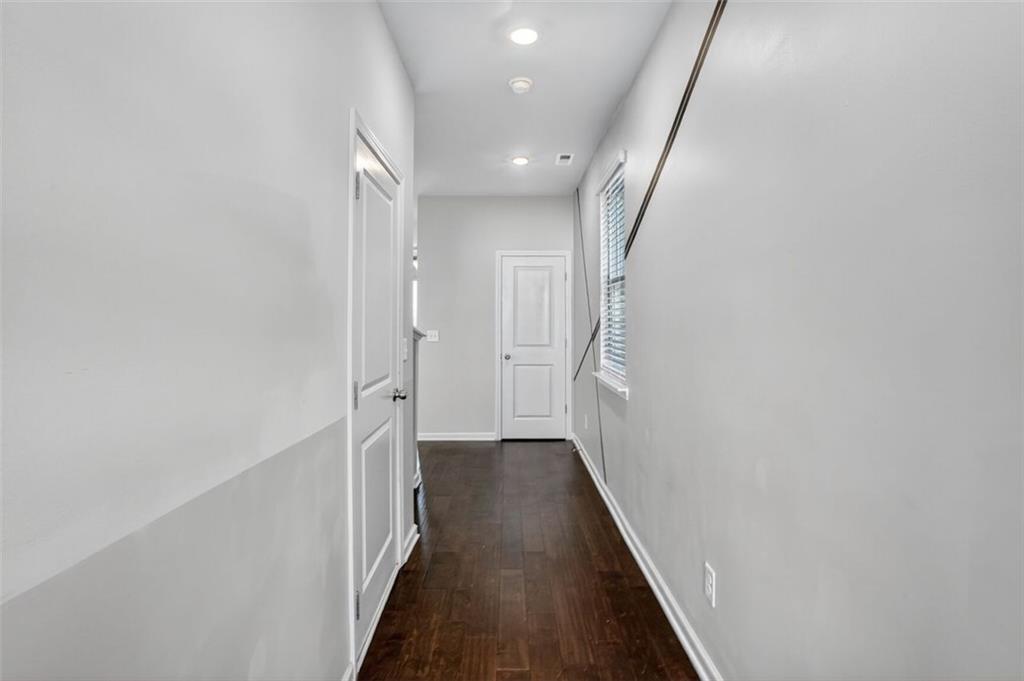 1553 Spring Hollow Way Stone Mountain, GA 30083 - Photo 2 of 27 a view of hallway with wooden floor