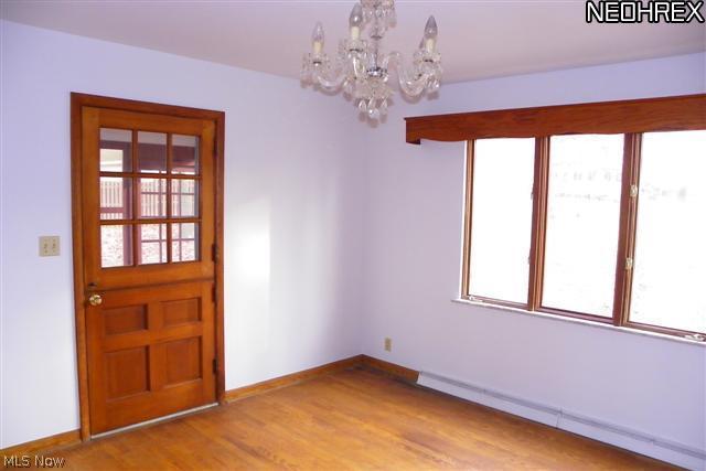 79 South Tamarack Road Akron, OH 44319 - Photo 8 of 25 Formal dining room w/ access screened porch