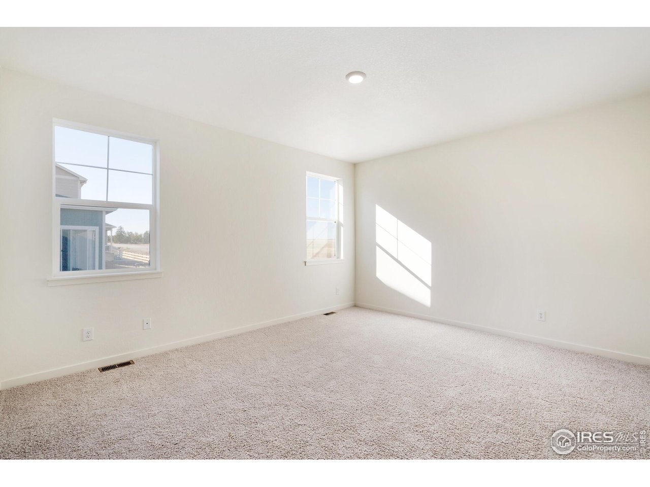 944 London Way Severance, CO 80550 - Photo 18 of 27 a view of empty room with window