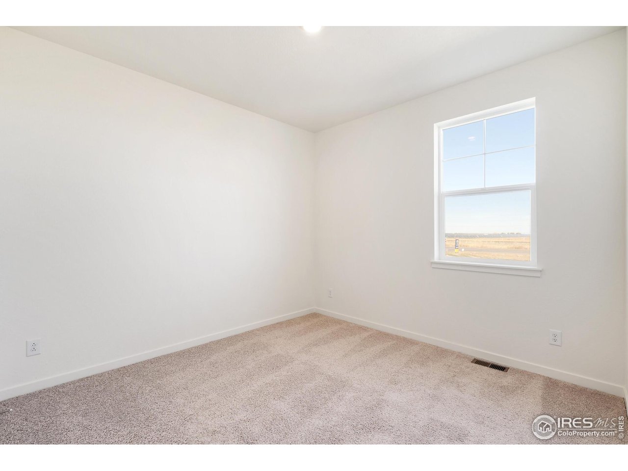 944 London Way Severance, CO 80550 - Photo 25 of 27 an empty room with a workbench