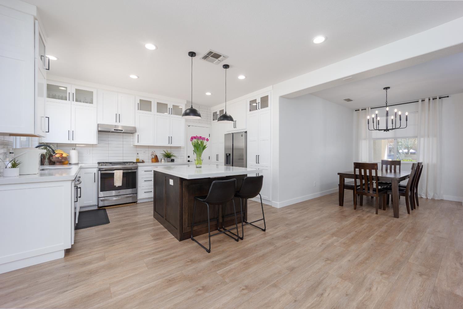 10969 Pelara Way Rancho Cordova, CA 95670 - Photo 11 of 39 a kitchen with a sink cabinets and window