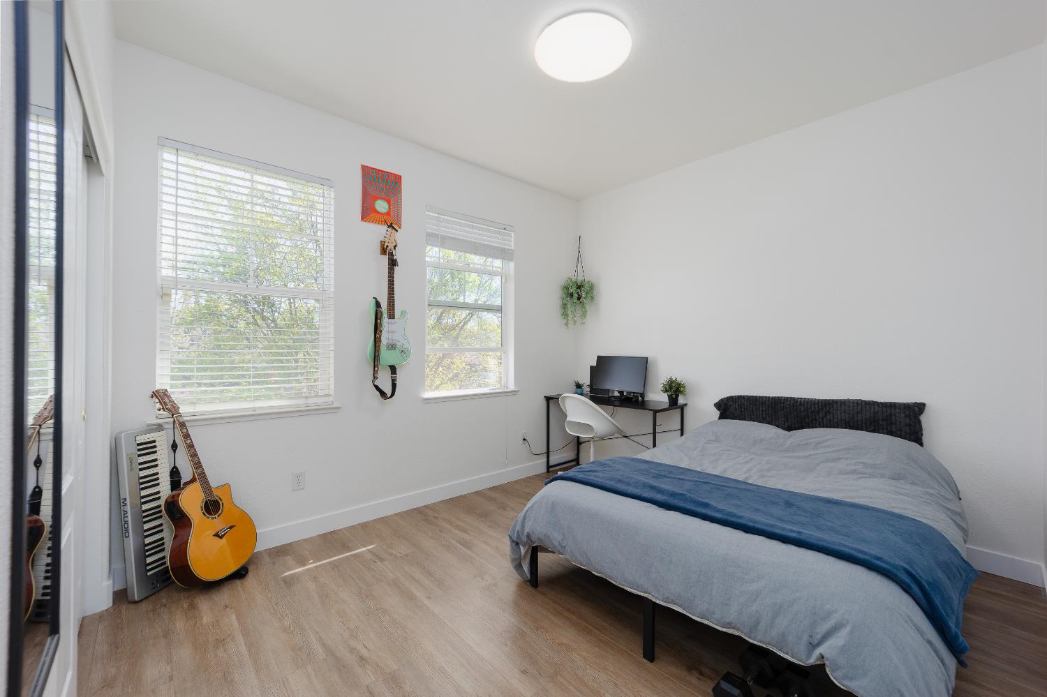 10969 Pelara Way Rancho Cordova, CA 95670 - Photo 22 of 39 a bedroom with a bed and a window