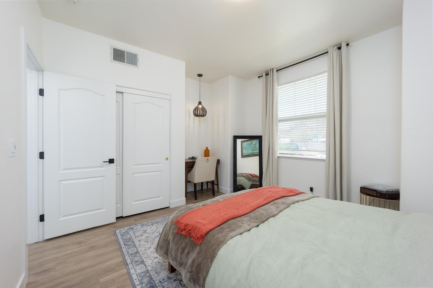 10969 Pelara Way Rancho Cordova, CA 95670 - Photo 25 of 39 a bedroom with a bed and a window