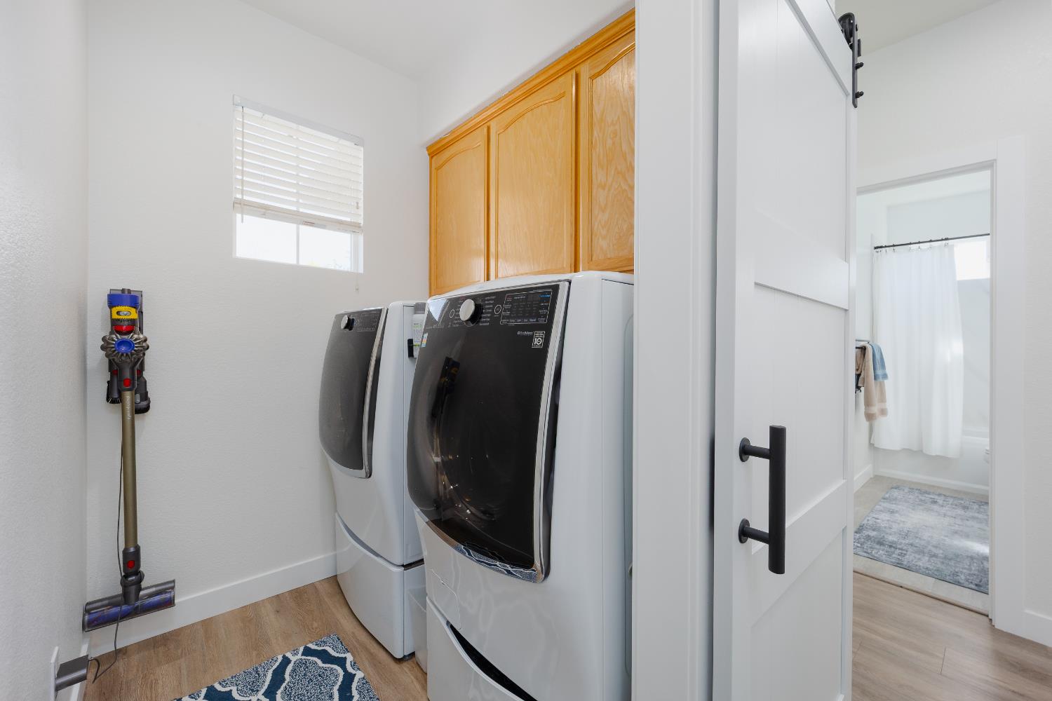 10969 Pelara Way Rancho Cordova, CA 95670 - Photo 36 of 39 a bathroom with a shower and mirror