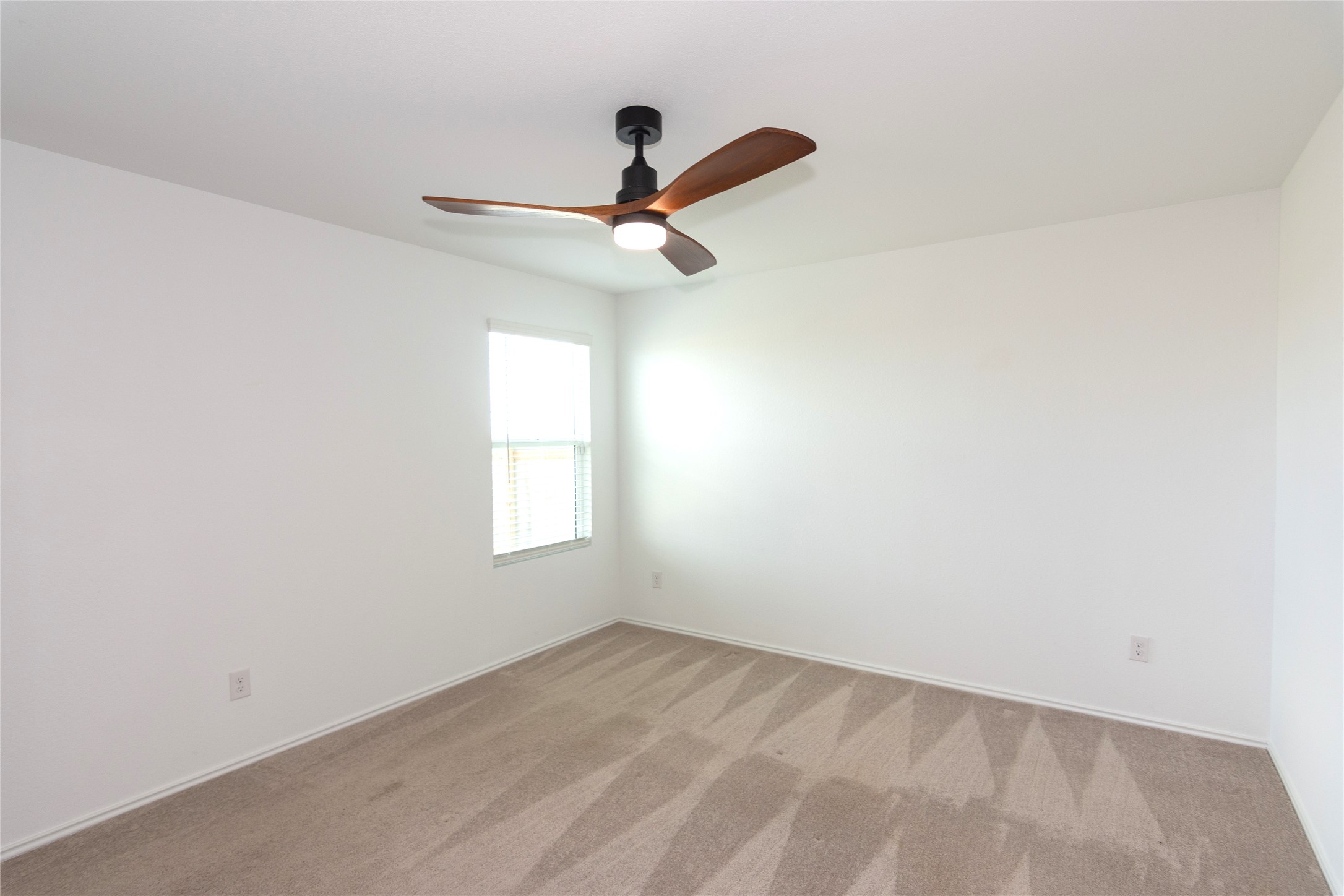 548 Rancho Del Cielo Loop Jarrell, TX 76537 - Photo 16 of 40 The primary bedroom has plenty of space for a king-sized bed