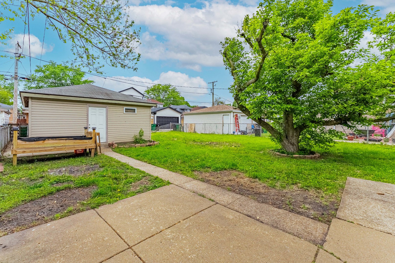 1330 Ridgeland Avenue Berwyn, IL 60402 - Photo 22 of 23 a view of backyard with a garden and plants