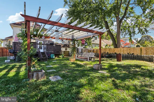 a view of a building with a yard