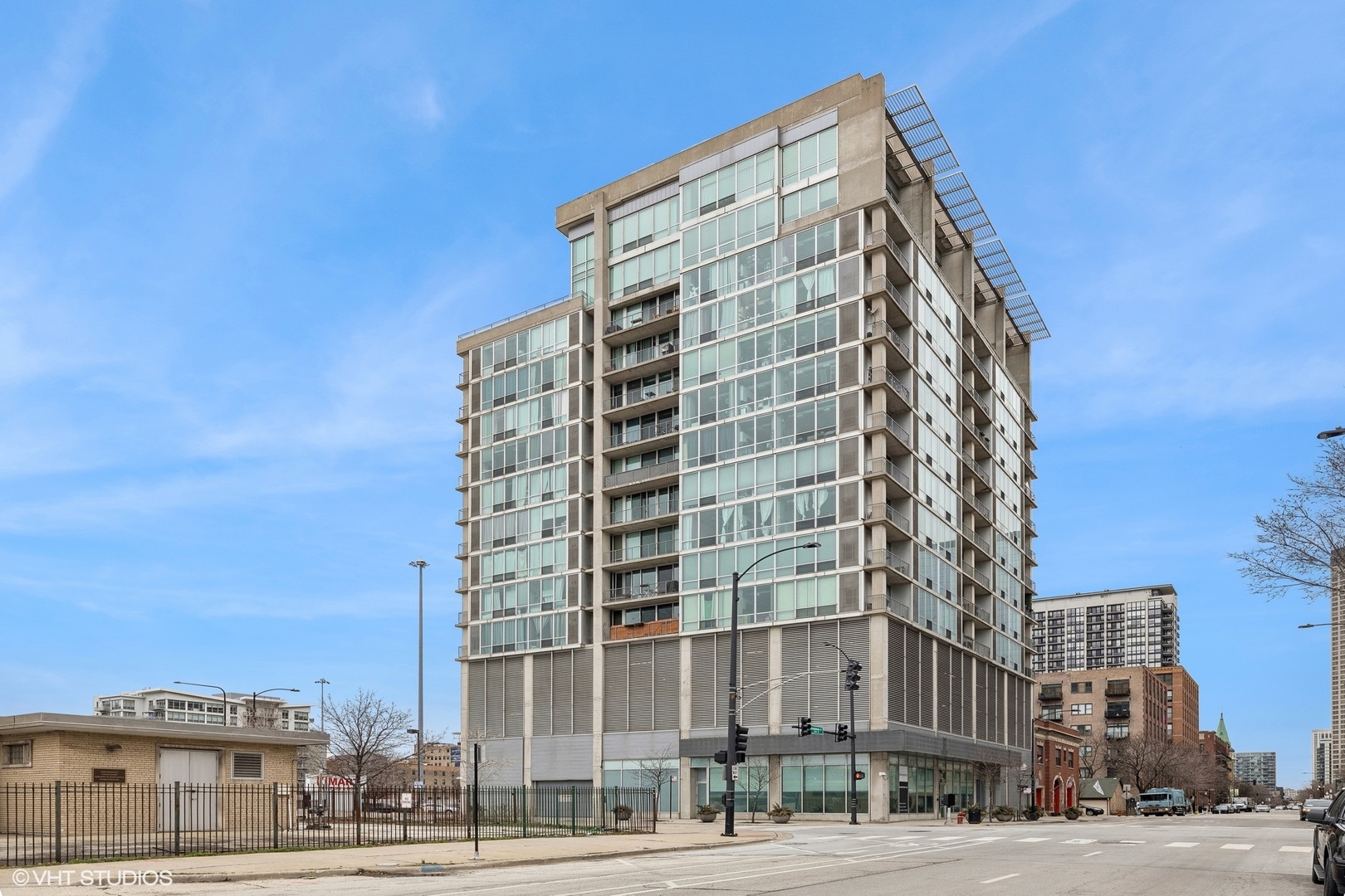 700 West Van Buren Street, Unit 1002 Chicago, IL 60607 - Photo 1 of 18 a view of a building with a street