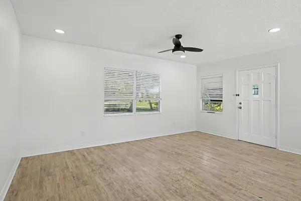 a view of a bathroom from the hallway