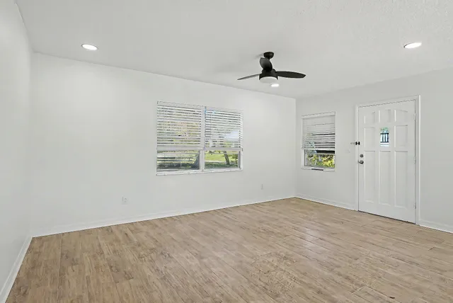 a view of a bathroom from the hallway