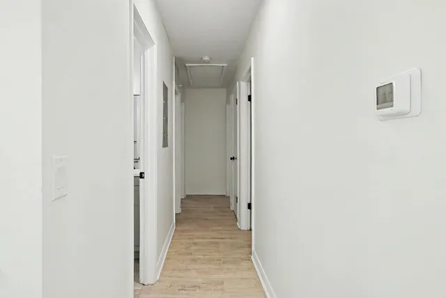 a bathroom with a double vanity sink toilet and shower