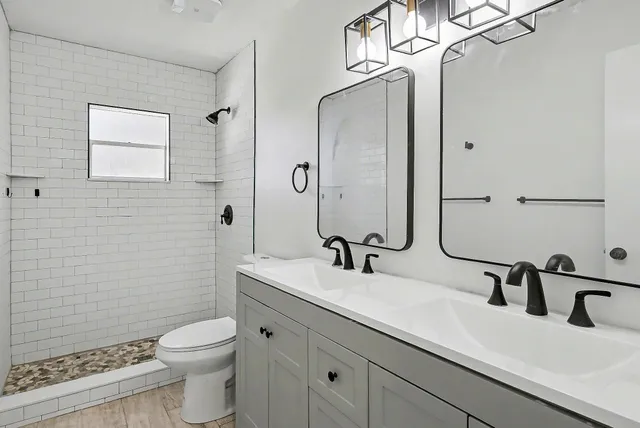 a bedroom with a bed and a chair