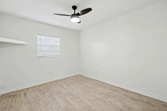 a utility room with a window washer and dryer