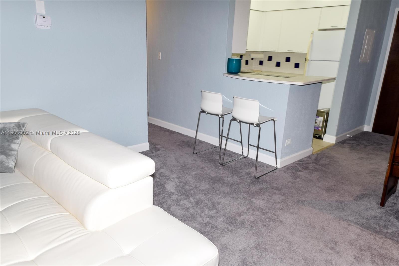 1500 Bay Road, Unit 1532S Miami Beach, FL 33139 - Photo 16 of 50 a bathroom with a sink toilet and mirror