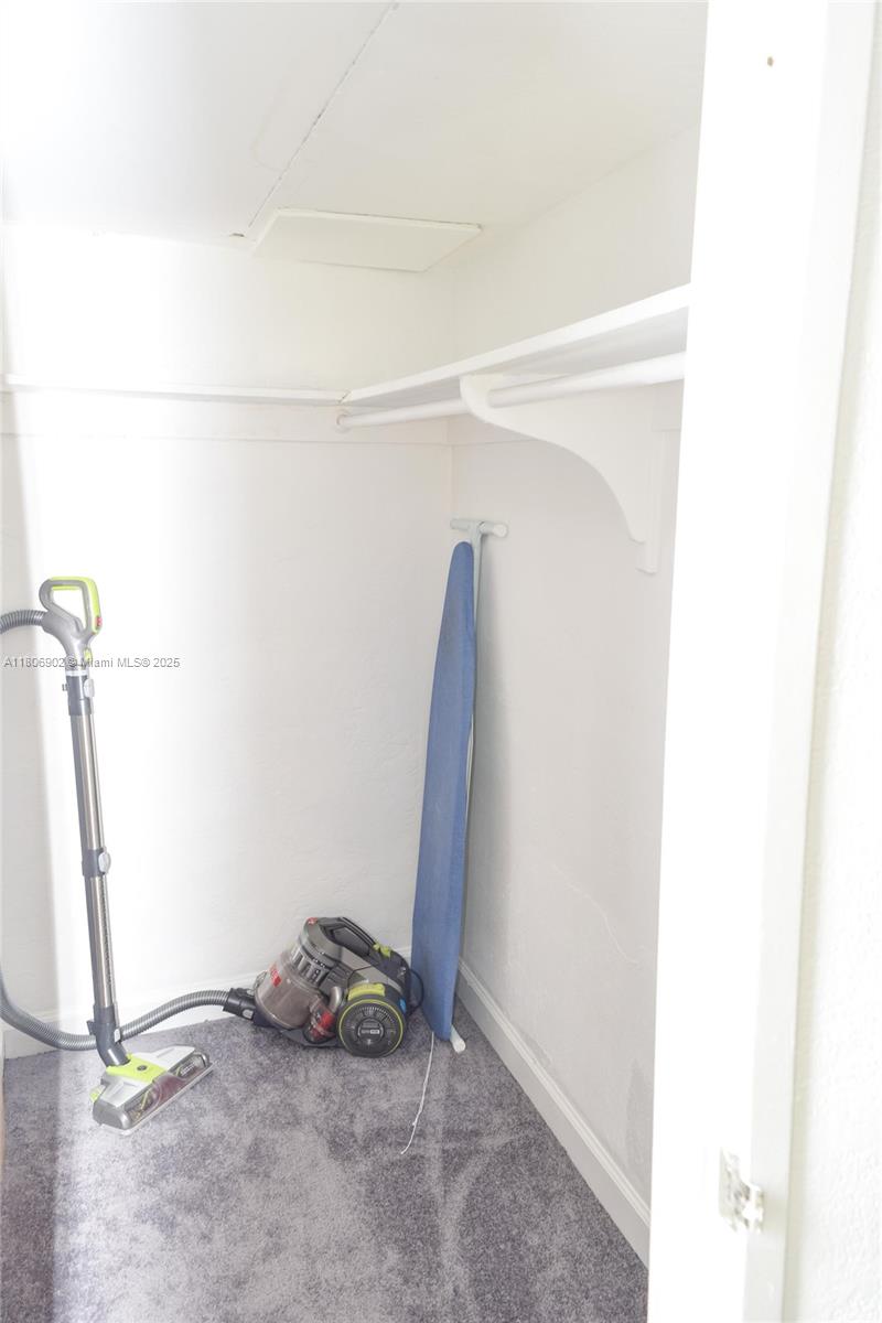 1500 Bay Road, Unit 1532S Miami Beach, FL 33139 - Photo 29 of 50 a view of a closet with storage