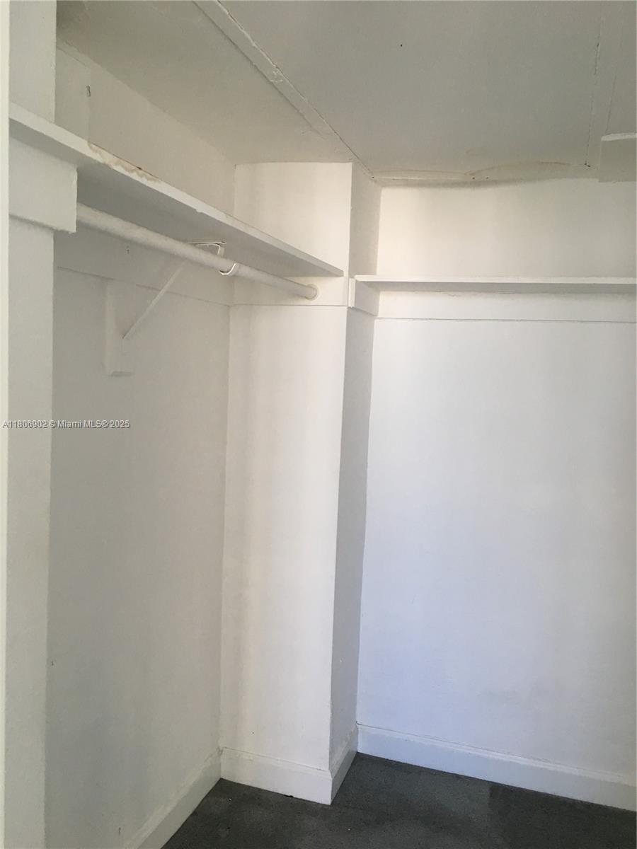1500 Bay Road, Unit 1532S Miami Beach, FL 33139 - Photo 41 of 50 a view of an empty walk in closet