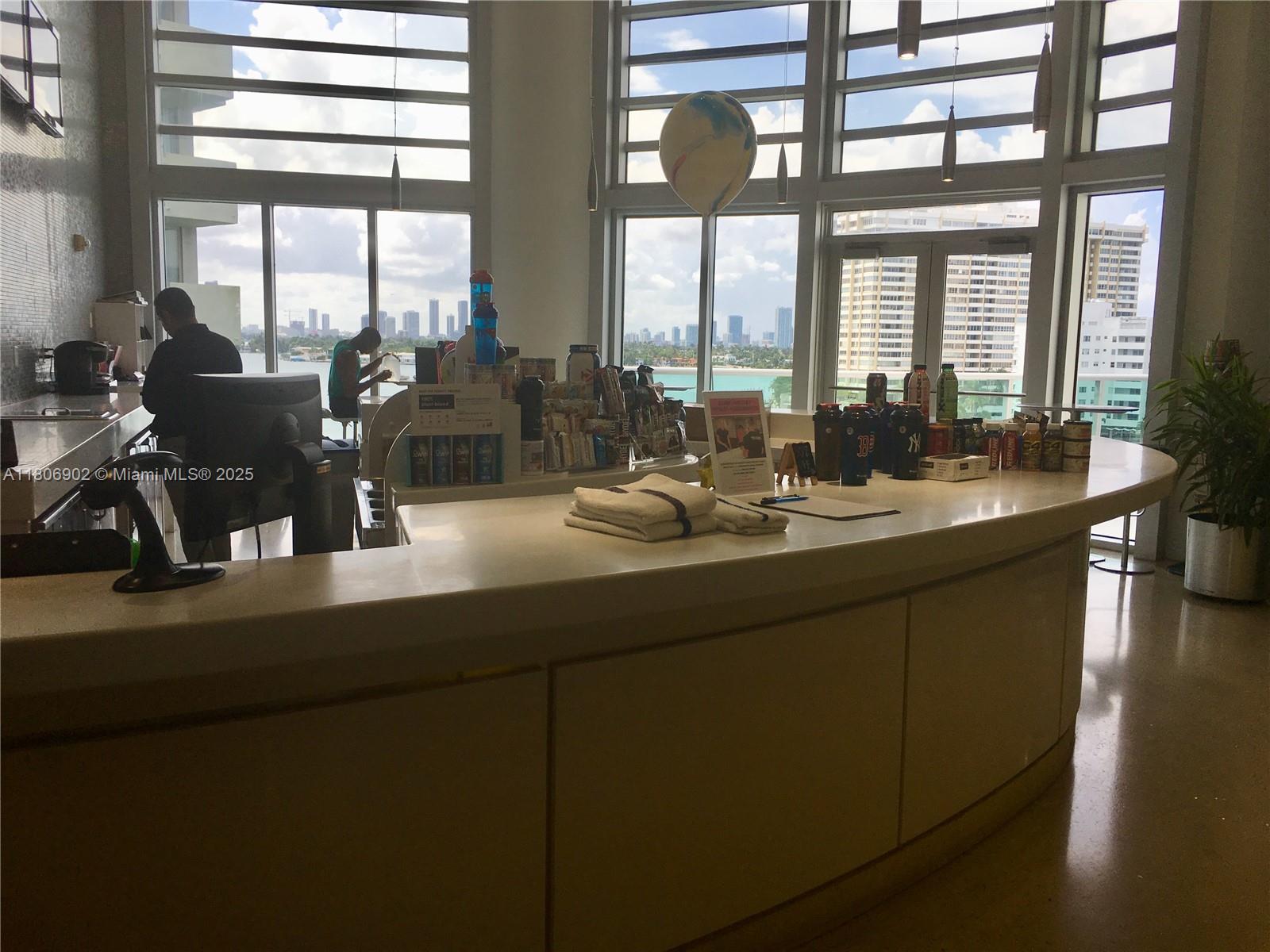 1500 Bay Road, Unit 1532S Miami Beach, FL 33139 - Photo 47 of 50 a kitchen with a sink and large window