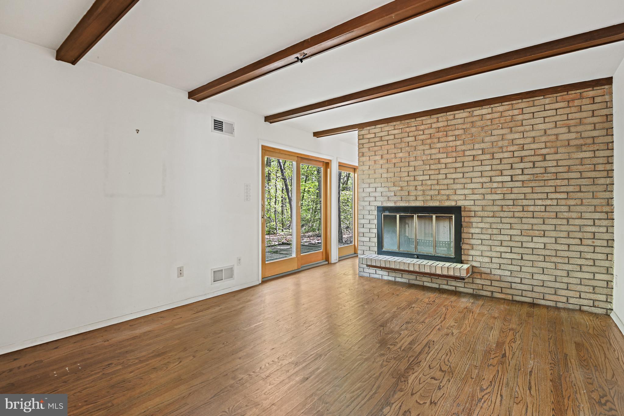 12008 Whip Road Reston, VA 20191 - Photo 15 of 48 The dining room also has a wood-burning fireplace.