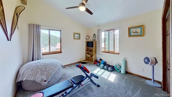 a room with furniture and a window