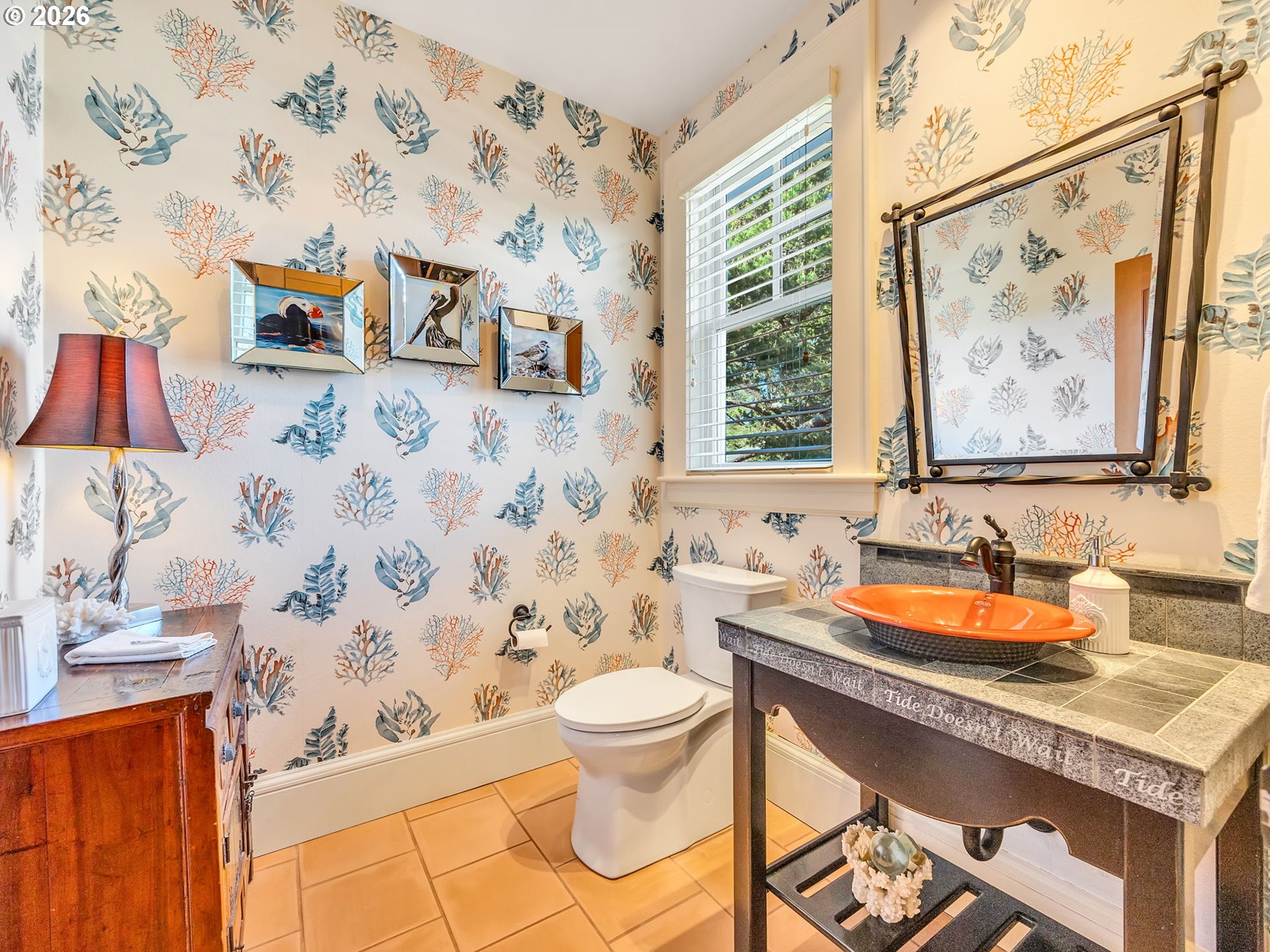 89079 Pinehurst Road Warrenton, OR 97146 - Photo 45 of 46 a bathroom with a sink and a mirror