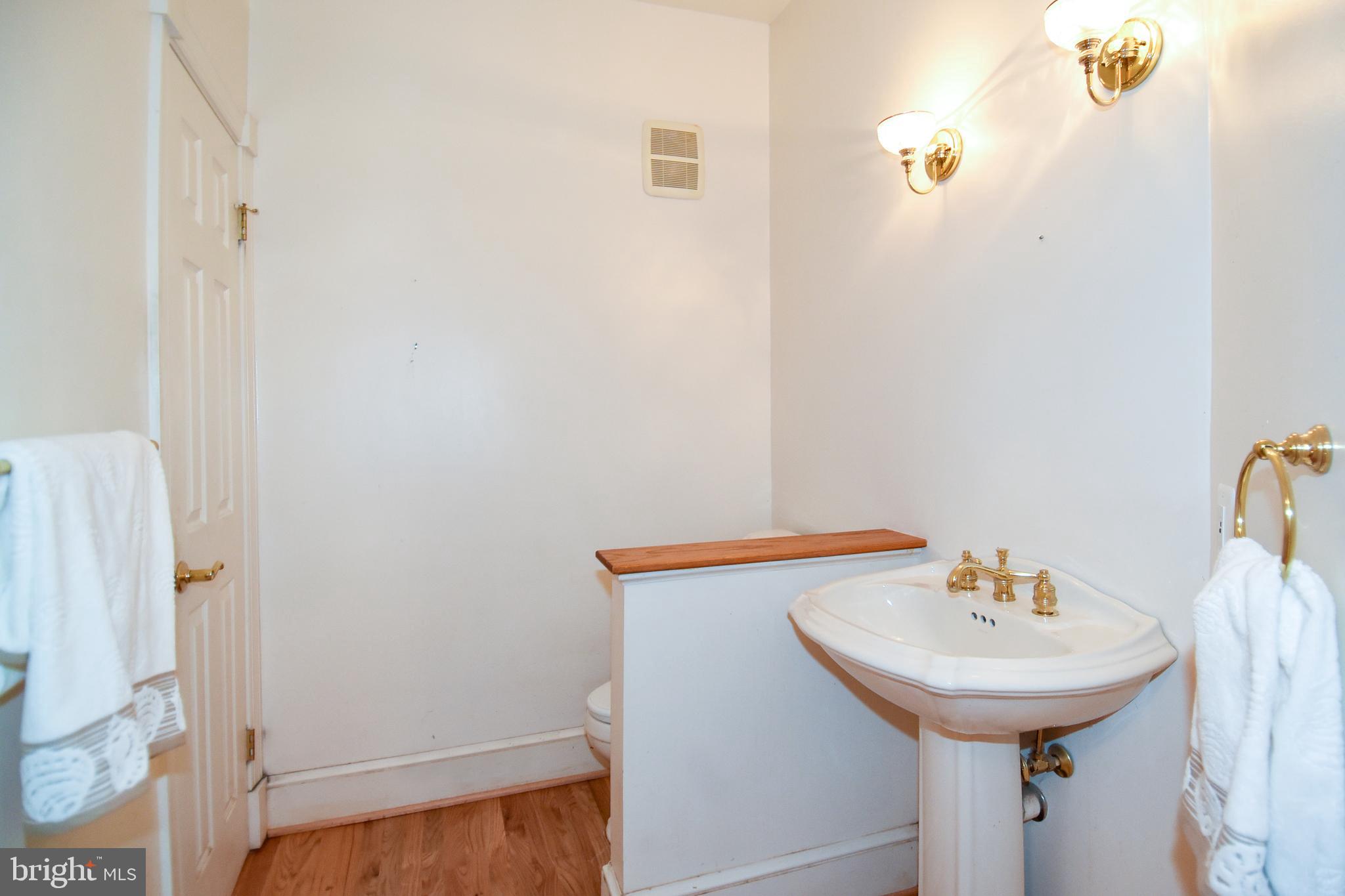 15804 Laughlin Lane Silver Spring, MD 20906 - Photo 27 of 69 Foyer 1/2 bath