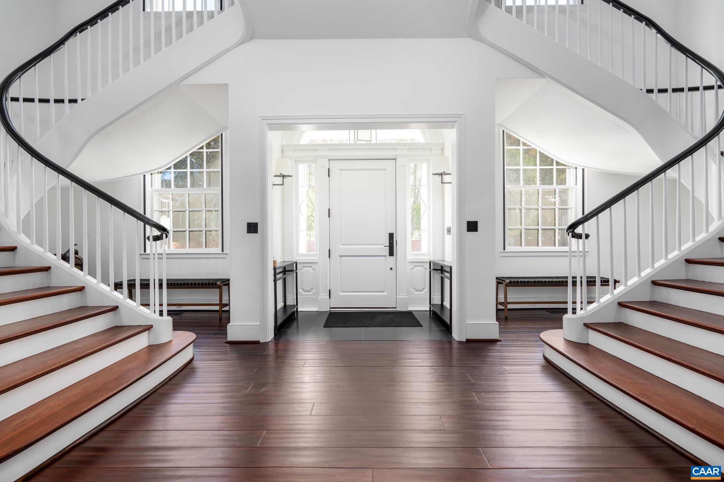 1859 Rivanna Farm Charlottesville, VA 22911 - Photo 3 of 45 a view of an entryway with wooden floor and a front door