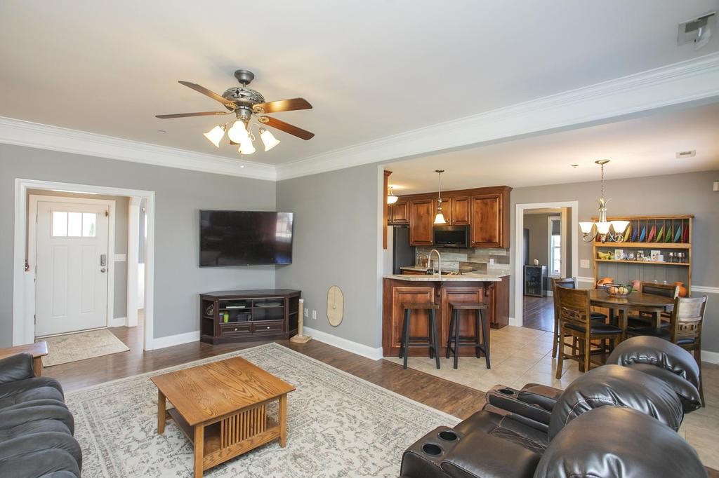 110 Edgewater Falls Murfreesboro, TN 37129 - Photo 11 of 31 a living room with furniture and a flat screen tv